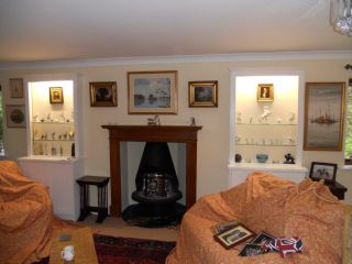 Bespoke display cupboards and fireplace surround